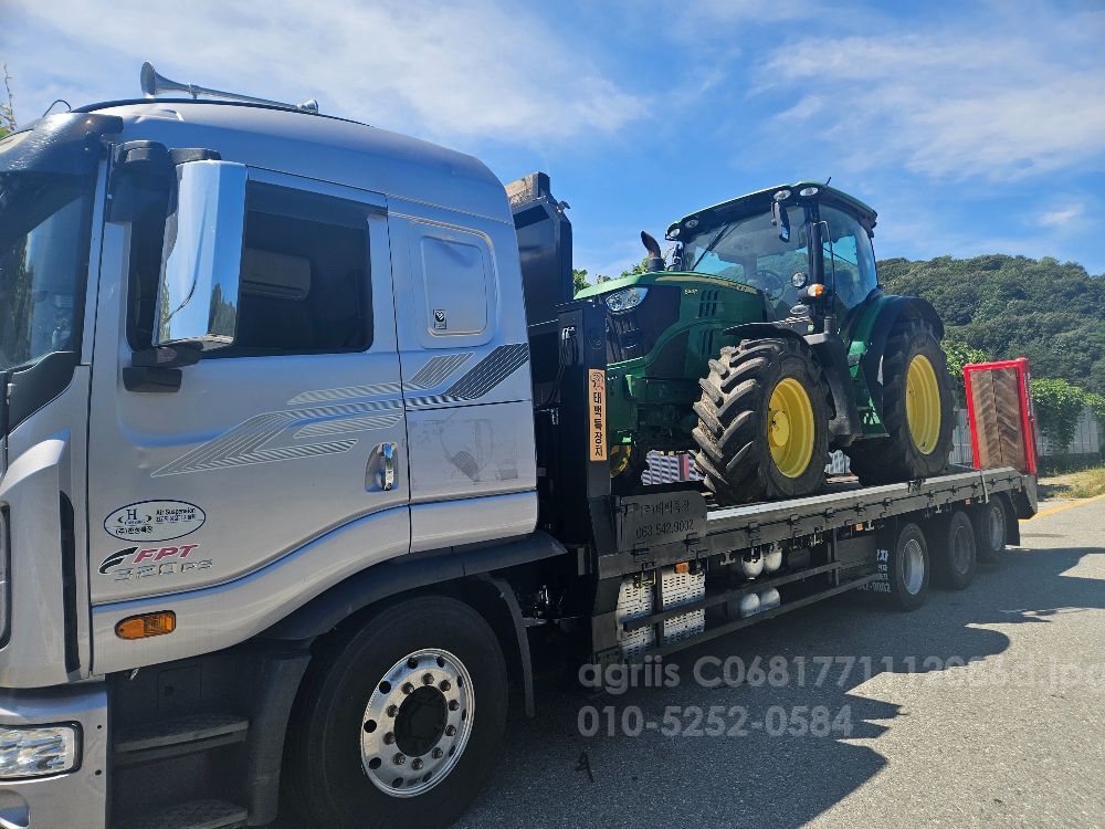 각종농기계.건설기계 운송해드립 셀프로더.추레라 농기계.건설기계.등 뒤우측면