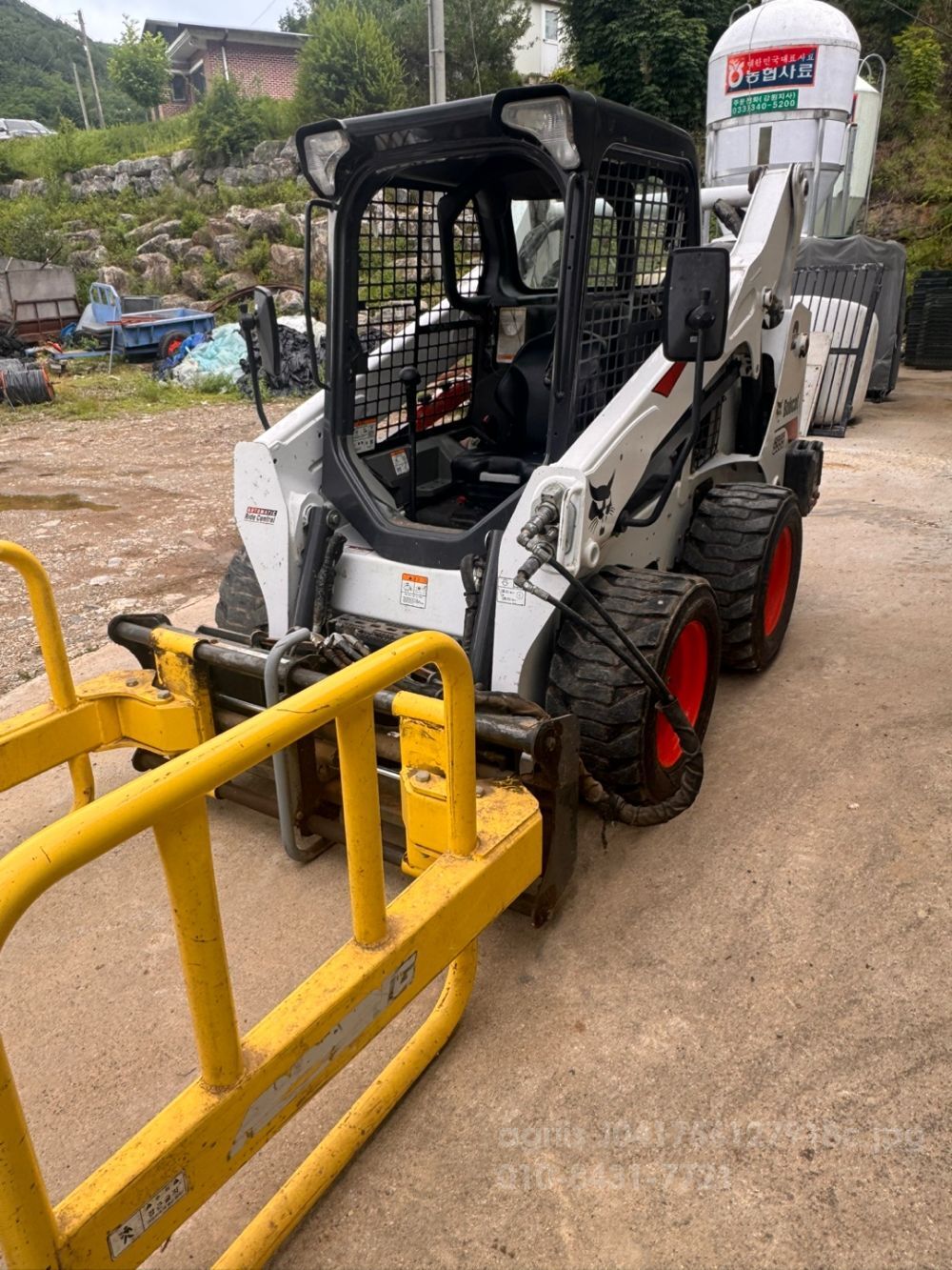 바브켓 스키드로더 S595