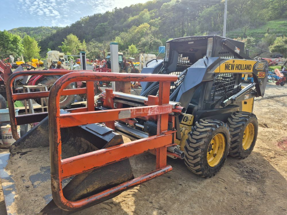 뉴홀랜드 스키드로더 L150